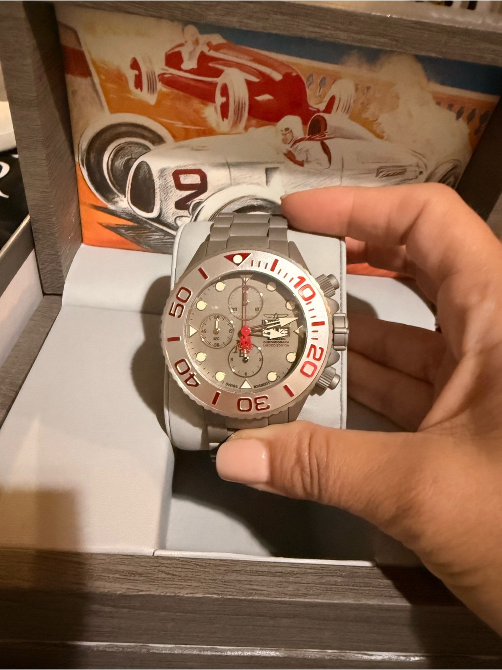 Invicta Men’s Silver Stainless Steel Chronograph Watch with Red Accents